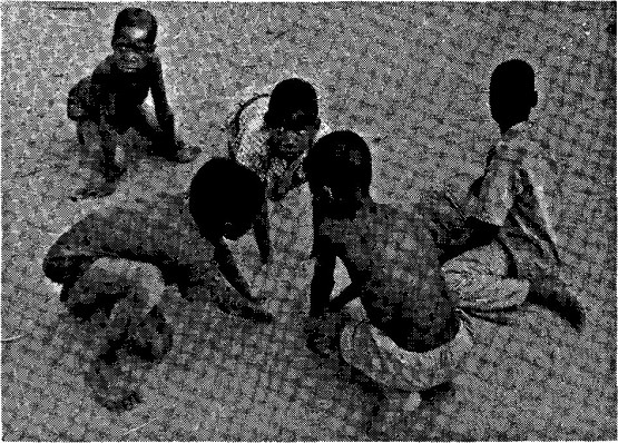 children playing marbles